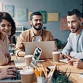 Group of people sitting at the desk